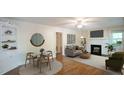 Inviting living room boasts a fireplace, hardwood floors, and ample natural light at 409 Green St, Sanford, NC 27330