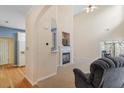 Inviting living room with fireplace, neutral carpet and access to the backyard through sliding glass doors at 1208 Copper Creek Dr, Durham, NC 27713