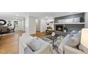 Bright and airy living room featuring hardwood floors and a fireplace at 215 Westridge Dr, Raleigh, NC 27609