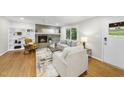 Comfortable living room with a brick fireplace and ample seating at 215 Westridge Dr, Raleigh, NC 27609
