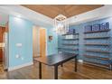Stylish dining room with modern light fixture and built-in shelving at 618 N Boylan Ave # 622, Raleigh, NC 27603