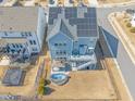 Aerial view of a home featuring solar panels, a deck, and a backyard with a plunge pool at 6633 Penfield St, Wake Forest, NC 27587
