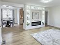 Spacious living room seamlessly connects to the dining area, creating an open and inviting atmosphere at 707 Wade Ave, Raleigh, NC 27605