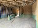 Unfinished living room showing the framing and construction stage, revealing the home's structure at 803 Fireship Rd, Fuquay Varina, NC 27526