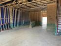 Spacious basement featuring unfinished walls and ceilings provides a blank canvas for customization and versatile use at 805 Fireship Rd, Fuquay Varina, NC 27526