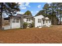 A view of the home with well-maintained shrubs at 900 Roxboro Road, Oxford, NC 27565
