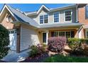 Attractive exterior showcasing well-manicured landscaping, complemented by classic architecture and a welcoming front entrance at 9508 Vira Dr, Raleigh, NC 27617