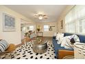 Bright living room with hardwood floors, modern decor, and a comfortable seating area at 106 Eugene St, Carrboro, NC 27510