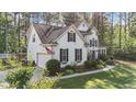 Beautiful two-story home featuring a side-entry garage and well-maintained landscaping at 106 Wolverton Dr, Clayton, NC 27527