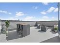 Outdoor rooftop terrace featuring a dining table, seating and nice view at 138 North White St # 200, Wake Forest, NC 27587