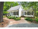 A beautiful home with a winding brick driveway and a welcoming front exterior at 2481 Foxwood Dr, Chapel Hill, NC 27514