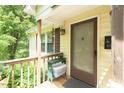 Cozy covered porch with a bench, perfect for relaxing outdoors at 306 N Sixth St, Mebane, NC 27302