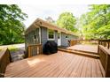 Large wooden deck offering plenty of space for entertaining and enjoying the serene backyard at 529 Orindo Dr, Durham, NC 27713