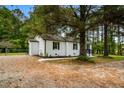 Charming single-story brick home with landscaped yard and walkway at 109 Riverbend Dr, Archer Lodge, NC 27527