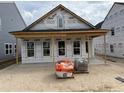 New home construction shows the framing and exterior materials before siding and finishing are installed at 2874 Quarry Rd # 165, Rolesville, NC 27571