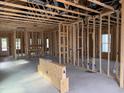Interior view of the new home build shows the framing and window placement at 2874 Quarry Rd # 165, Rolesville, NC 27571