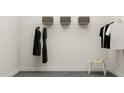 Well-organized walk-in closet with ample storage space and stylish decor at 312 Calvander Ln, Apex, NC 27539