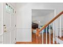 Inviting foyer featuring hardwood floors and views of the living room at 7213 St Ledger Dr, Raleigh, NC 27613