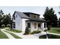 Stylish home featuring modern architecture, a covered porch, and manicured front yard at 909 Oberlin Rd, Raleigh, NC 27605