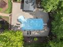 Aerial view of a private pool and patio area at 10825 Rondeau Woods Ct, Raleigh, NC 27614