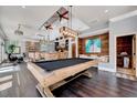 Recreation room with game table and full bar at 187 Stoney Creek Way, Chapel Hill, NC 27517