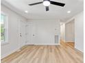 Open floor plan living room with neutral paint and flooring at 2311 Wintergreen Pl, Durham, NC 27707