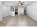 Spacious living room with neutral carpet and a ceiling fan at 351 Gilman Ln # 109, Raleigh, NC 27610