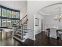 Open-concept with staircase and chandelier at 112 Glenspring Way, Morrisville, NC 27560
