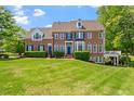 Beautiful brick home with a manicured lawn and charming front entrance at 12527 Bellstone Ln, Raleigh, NC 27614