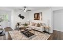 Bright living room with stylish decor, plush seating, and modern artwork at 3907 Inwood Dr, Durham, NC 27705