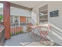 Charming porch with a metal table, seating, and a view of the neighborhood at 623 Massey Ave, Durham, NC 27701