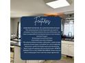 Bright kitchen with white cabinetry, a breakfast bar, ample storage, and an adjoining dining area at 107 N Pearl St, Princeton, NC 27569