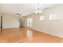 Open-concept living area featuring hardwood floors, natural light, and a neutral color palette at 1522 Palmer Hill Dr, Durham, NC 27703