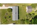 An aerial view displays the roof and yard showing its layout, detached garage, and landscaping at 2910 Dove Ln, Raleigh, NC 27604