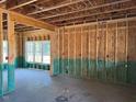 Interior home construction showing the framing, electrical and plumbing of an unfinished room at 337 Green Pines Estates Dr, Kenly, NC 27542