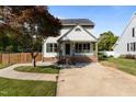 Charming two-story home features a covered front porch and well-maintained lawn at 1114 Balmoral Dr, Cary, NC 27511