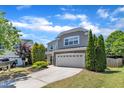 Beautiful home with lush landscaping, a well-kept lawn, and a charming, inviting curb appeal at 120 Cobblebrook Ct, Holly Springs, NC 27540