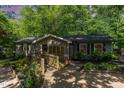 Inviting single story home with walkway and well-tended garden beds, offering a peaceful and welcoming curb appeal at 2029 Atkins Dr, Raleigh, NC 27610