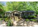 Inviting single story home with walkway and well-tended garden beds, offering a peaceful and welcoming curb appeal at 2029 Atkins Dr, Raleigh, NC 27610