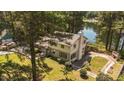 An aerial view of the two-story home with lake access at 409 W Holding St, Smithfield, NC 27577