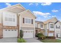 Beautifully maintained townhome with a one car garage, and nicely landscaped yard at 5912 Hourglass Ct, Raleigh, NC 27612