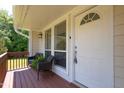 Close-up of the front porch with seating, providing a cozy view of the home's entrance at 103 Westview Dr # Apt K, Carrboro, NC 27510