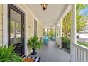 Inviting front porch with seating area, perfect for enjoying the outdoors at 216 N Bloodworth St, Raleigh, NC 27601