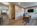 Neutral office with wooden desk and chair, bright window for natural light at 238 Oak Meadow Ln, Angier, NC 27501