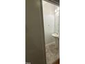 Convenient powder room with pedestal sink and neutral decor, located on the main floor at 1304 Cozart St # 109, Durham, NC 27704