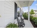 Inviting porch area featuring seating and providing a relaxing outdoor space at 1616 Silo Ridge Dr, Wake Forest, NC 27587