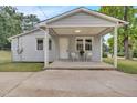 Cozy front porch with seating at 3312 Apache Dr, Raleigh, NC 27609