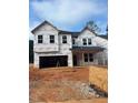 Exterior elevation of a new home with visible windows and a two-car garage under construction at 436 Golden Dragonfly St, Wake Forest, NC 27587