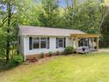 Charming single Gathering home with a covered front porch at 6125 Bellow St, Raleigh, NC 27609