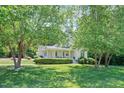 Charming home featuring a well-maintained lawn and inviting front porch at 7716 Micklewaithe Ct, Wake Forest, NC 27587